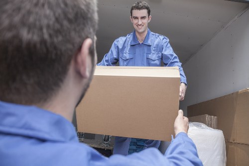Professional packing team organising household items for a move in Tofrance