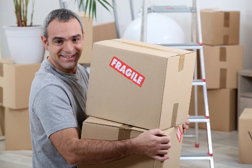 Removal team planning a local move in Tofrance with loading equipment