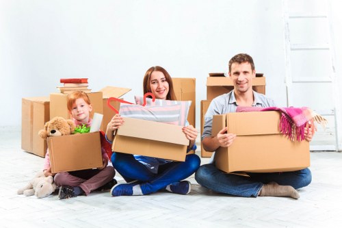 Professional movers loading household items in Tofrance