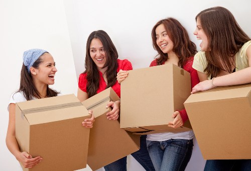 Loading furniture into a removals van for a Tofrance property