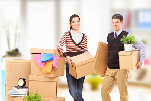 Careful loading of furniture and household items into a van