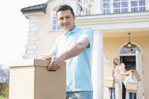 Careful packing of office equipment and files for a local business relocation