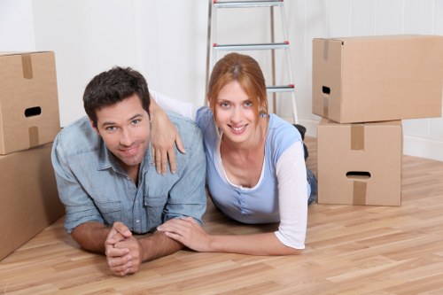 Removal team planning a local move in Tofrance with boxes and furniture