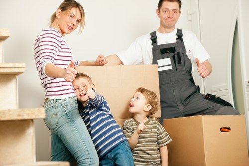 Packed boxes and furniture ready for transport by removal companies in Tofrance